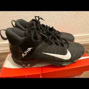 Nike cleats, under armor gloves